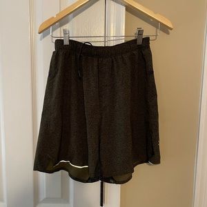 Men’s Lululemon Olive Green speckled Surge shorts. Inseam 6,